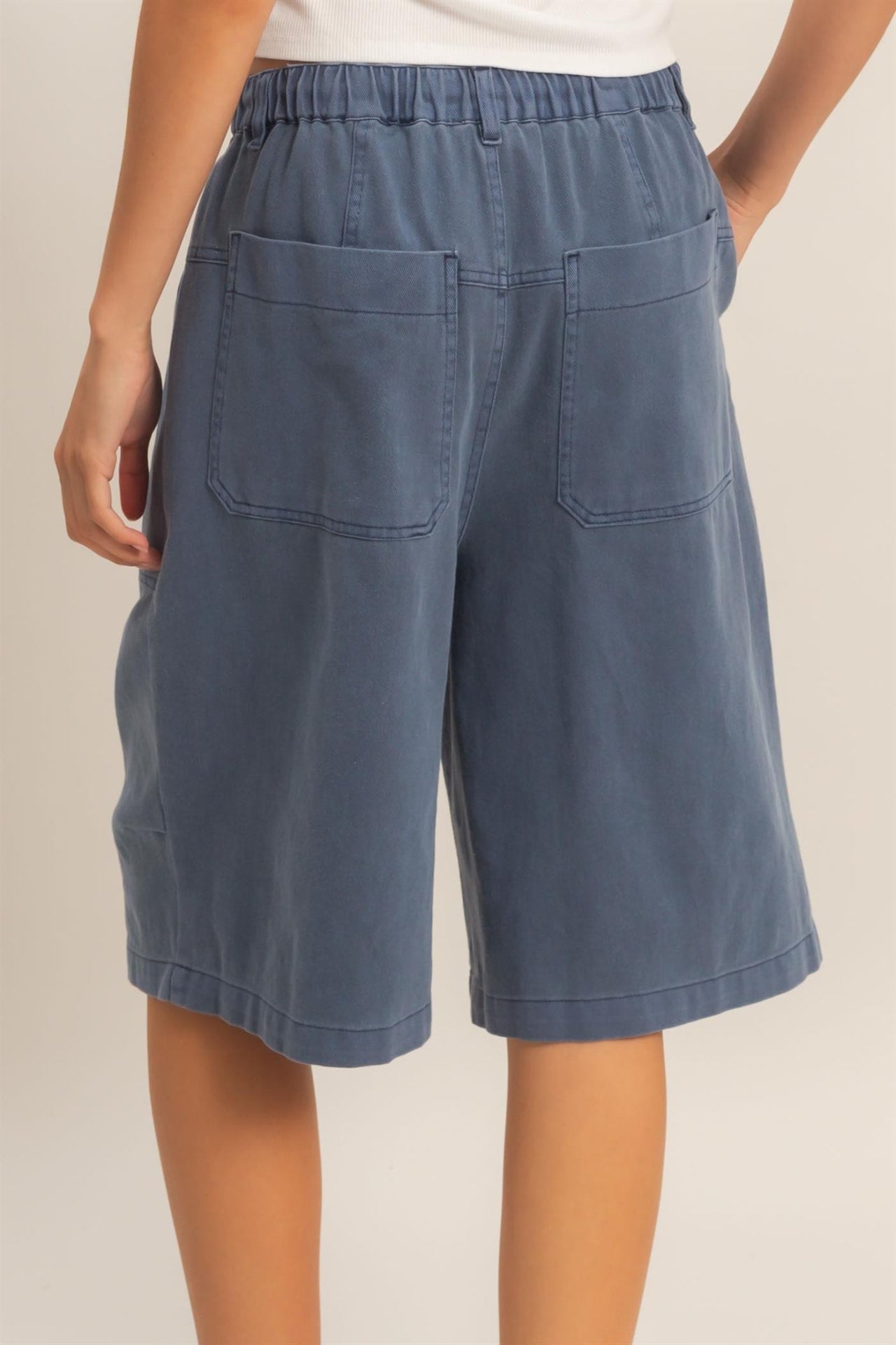 Navy jorts back view with two patch pockets